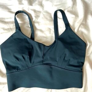 Bourne primitive sports bra. Size small, teal, comes with original bra pad inser